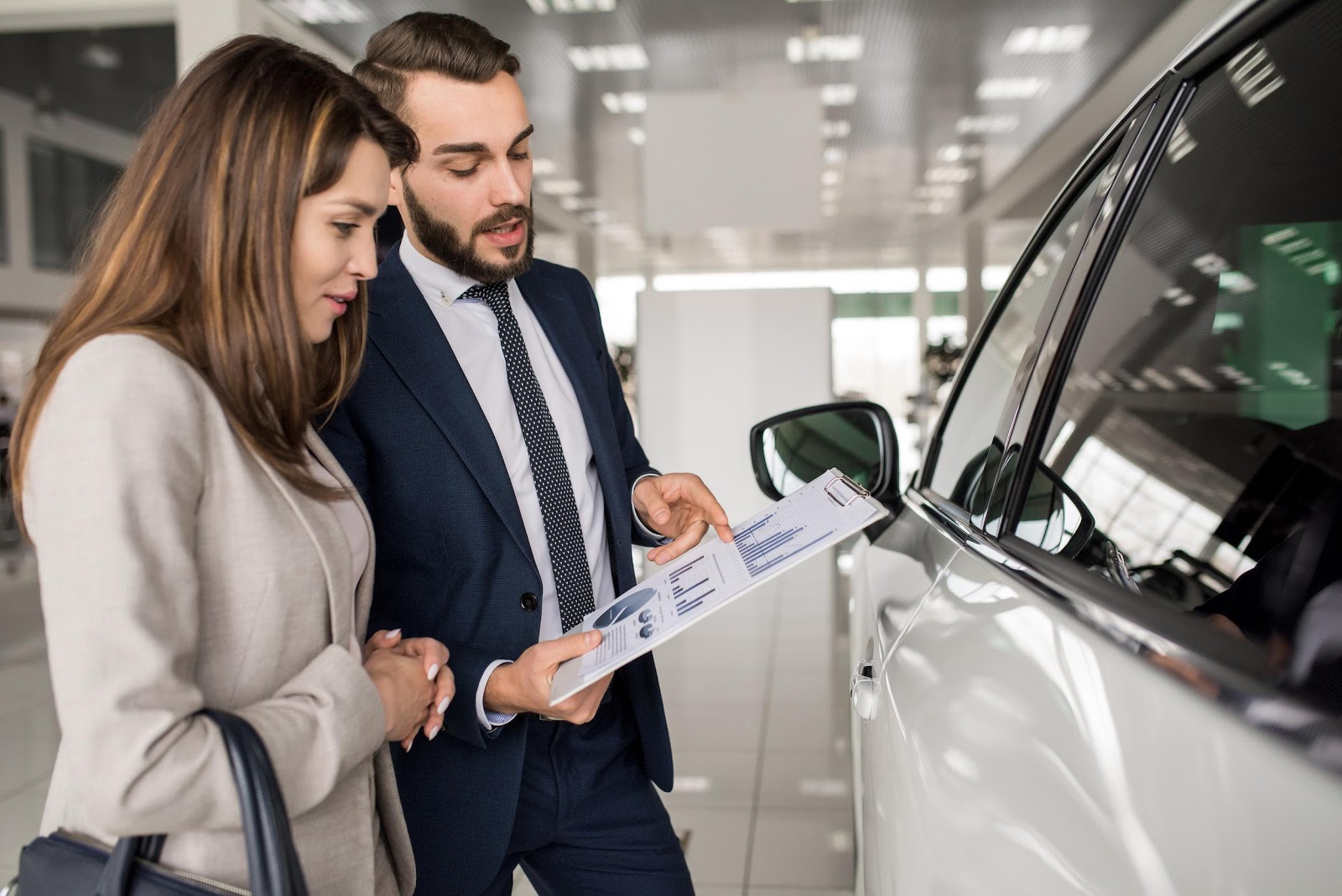 Автосалон. Шикарный выбор. He bought car.